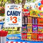 Jack’s Sugar Shack candy sign on a metal T-bar stand beside a colorful display of movie candy boxes and packaged treats.